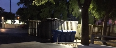 Image of security lights on entry garbage areas.